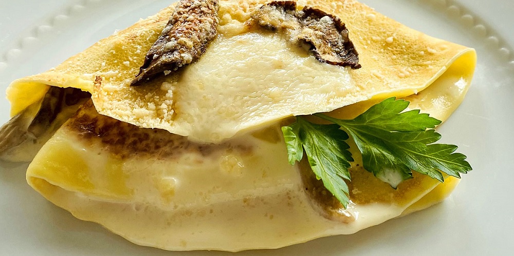 Crespelle ai funghi porcine e crema di ricotta